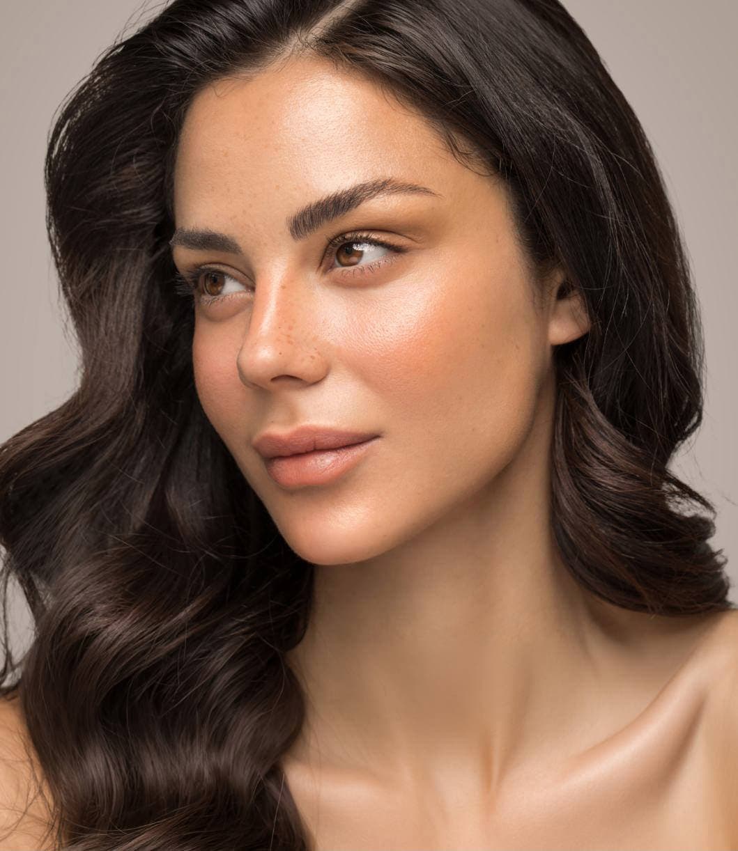 Woman with a balanced facial profile after rhinoplasty